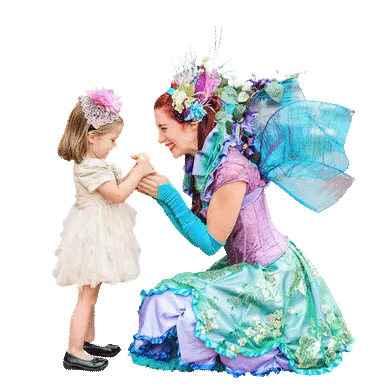 A Happily Ever Laughter faerie greeting a delighted child