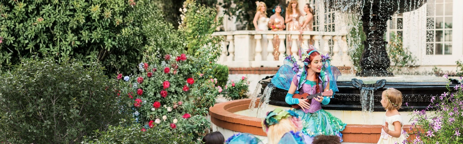 Costumed performers keeping children enchanted at a wedding.