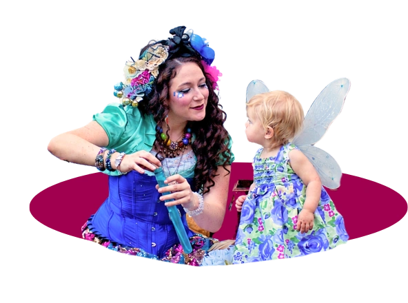 A Happily Ever Laughter faerie with a child in a fairy costume, sharing a magical moment with a treasure box.