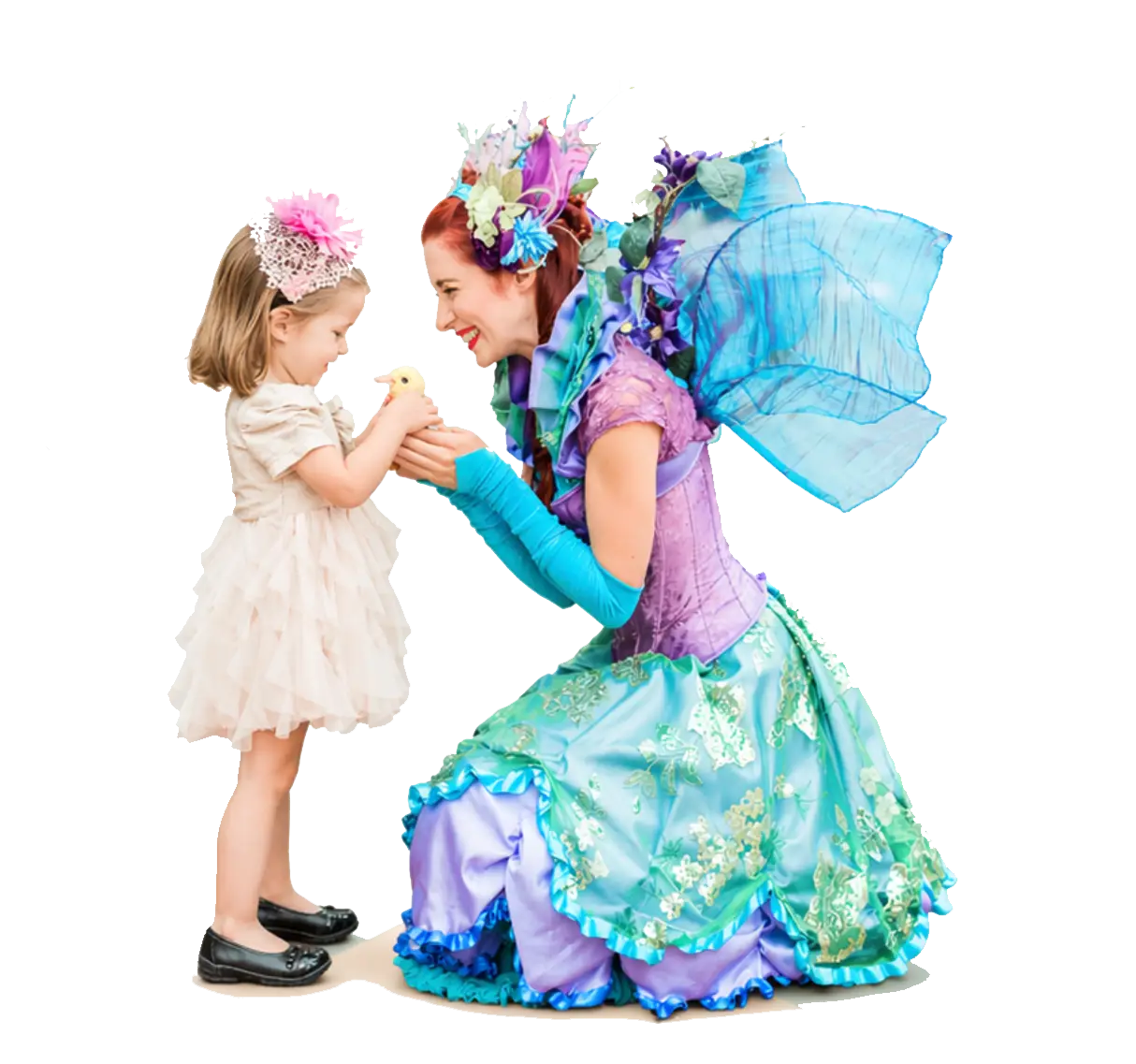 A Happily Ever Laughter faerie sharing a moment with a child.